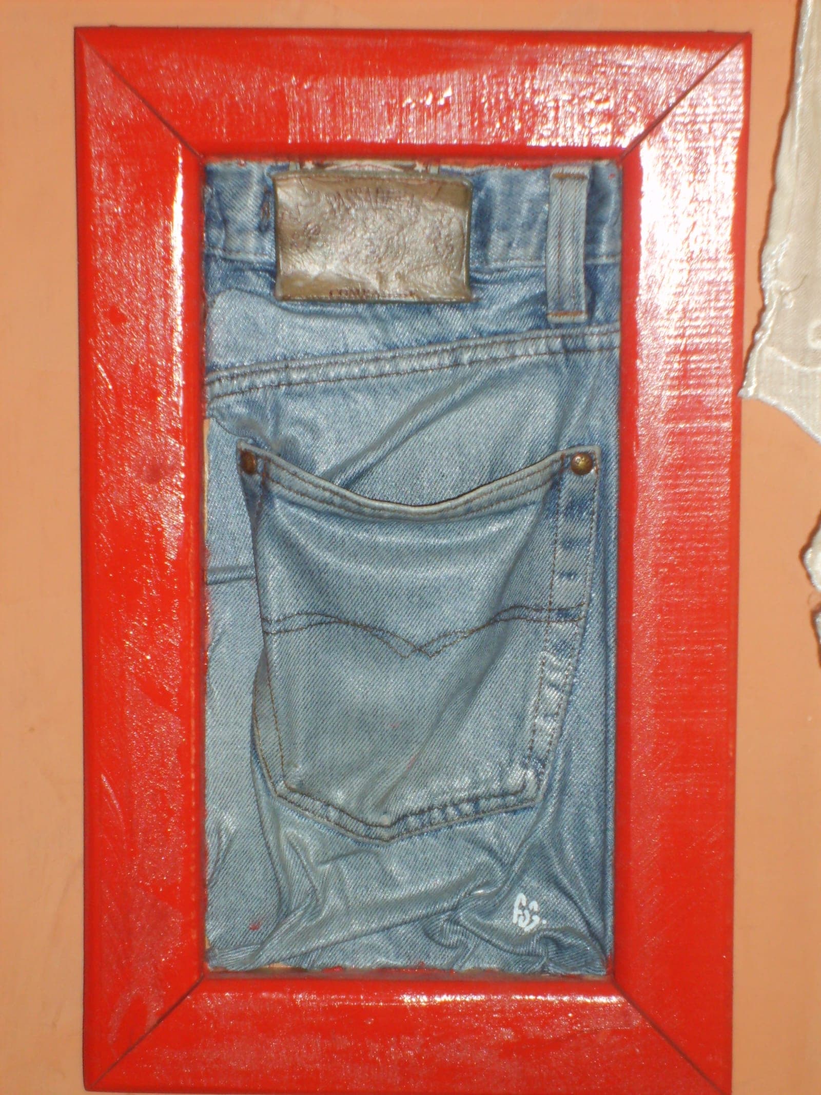 Poche arrière encadrée, Toile de jean stratifiée