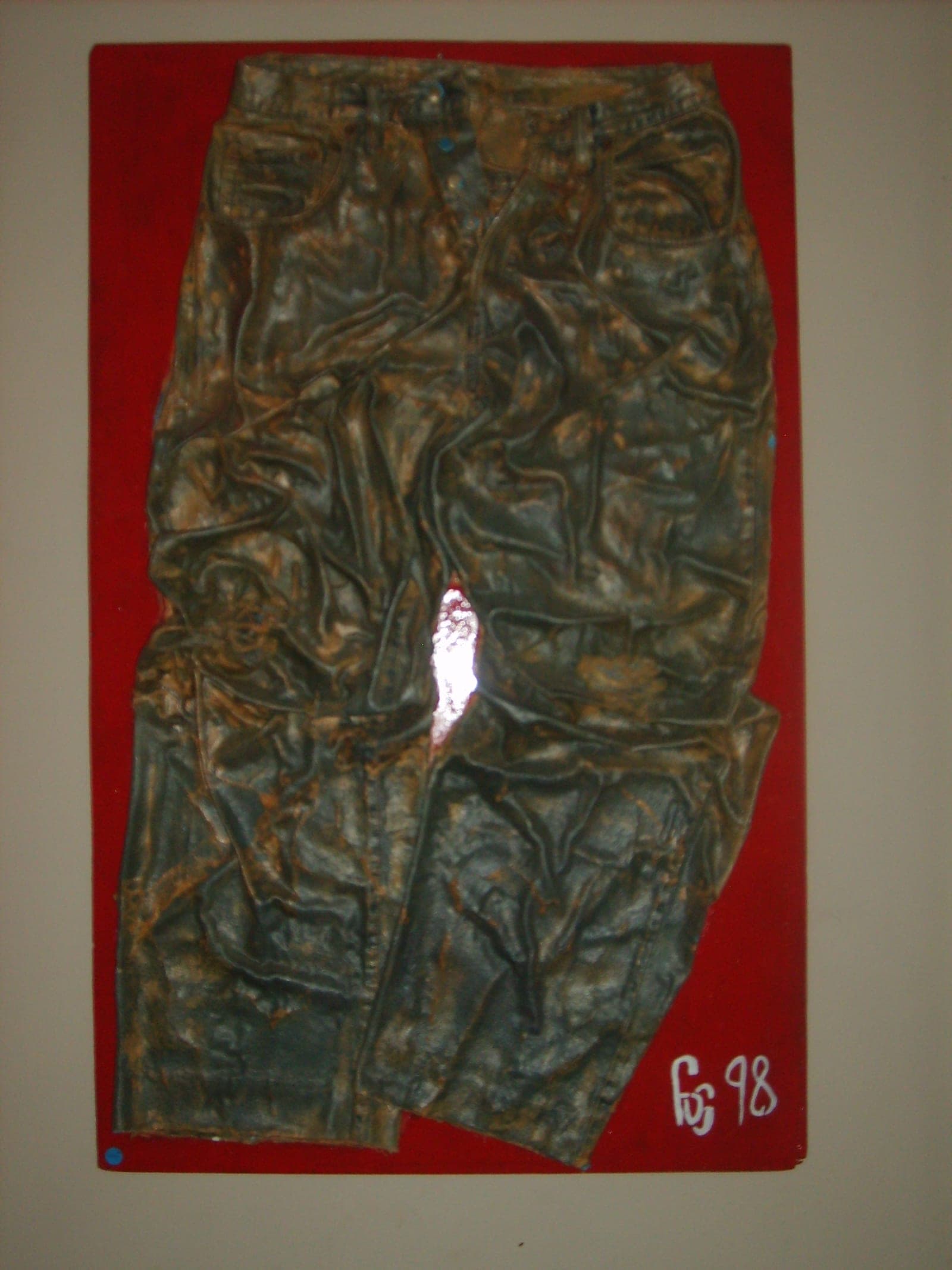 Jean's bronze sur bois (1998), Jean stratifié patine bronze sur bois laqué rouge, 1998
